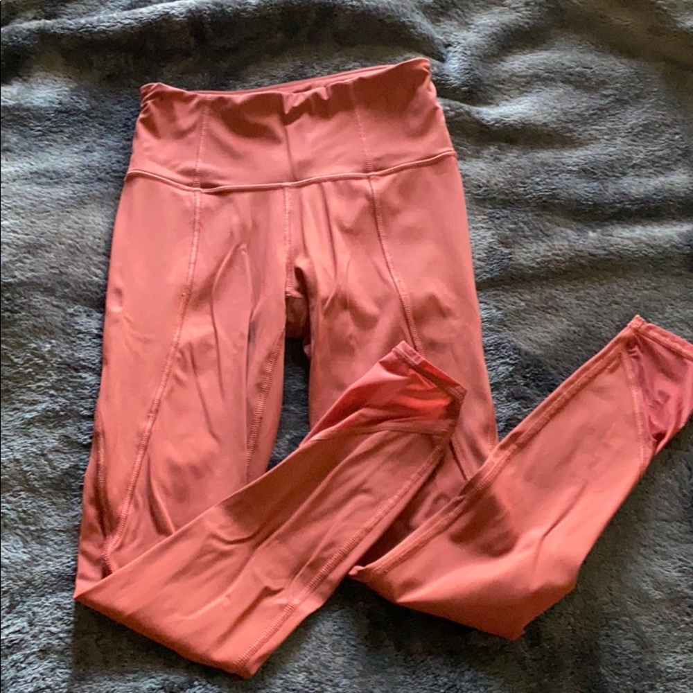 Athleta Lightning Stash Pocket 7/8 Tight